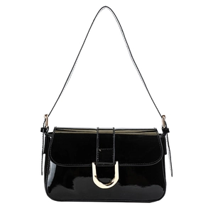 Glossy black patent leather shoulder bag with a stylish golden horseshoe U-buckle detail