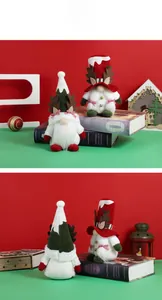 Detail of Christmas gnomes with antlers and long white beards in festive holiday colors