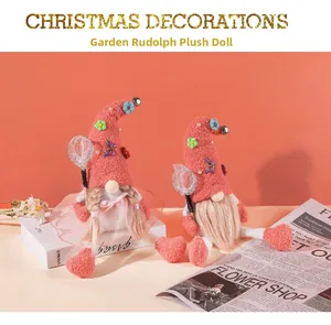 Detailed set of pink plush garden gnomes with flowers and bells for Christmas decor