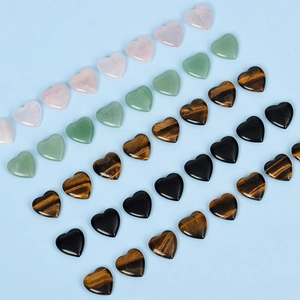Polished natural crystal heart stones in assorted minerals for jewelry making and healing
