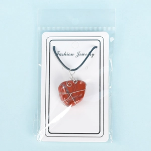 Natural red raw crystal stone pendant necklace with silver wire wrap and black cord strap