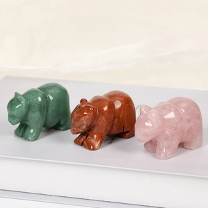 Three carved gemstone bears in rose quartz and green aventurine for home office decor