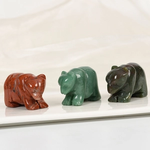 Three-piece set of hand-carved natural gemstone bear figurines in diverse mineral textures
