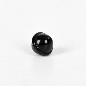 Polished black gemstone sphere with ribbed detail for crystal healing collections