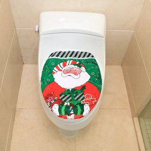 Close-up of Santa Claus themed toilet seat cover with festive patterns and soft fabric