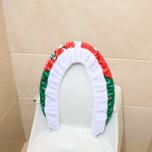 Christmas toilet seat cover with festive red and green patterns and white plush trim