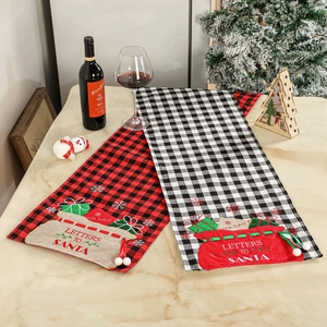 Christmas buffalo plaid table runner with Letters to Santa embroidery and gift box motifs