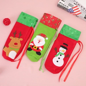 Christmas sequin wine bottle covers set featuring Santa, snowman, and reindeer designs