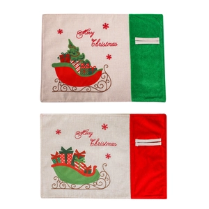 Christmas place mats set featuring festive red and green sleigh designs on beige linen
