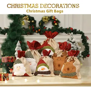 Détails des sacs de Noël en toile de jute avec motifs de Père Noël et rennes en applique