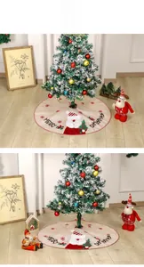Detail of Christmas tree skirt with Santa print, red piping, and faux linen texture