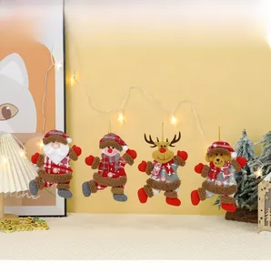 Set of 4 Christmas tree hanging ornaments featuring Santa and snowman in plaid patterns