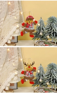 Detail showing plush Christmas bear and reindeer ornaments with scarves and hanging strings