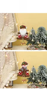 Detail of plush Santa and Snowman ornaments with plaid fabric and golden bells