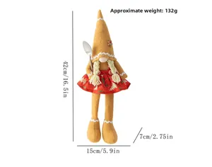 Detail of Christmas gingerbread gnome doll with pointed hat and silver spoon decoration