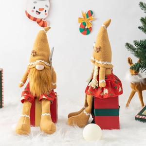 Gingerbread Christmas gnomes set with pointed hats and long legs on red gift boxes
