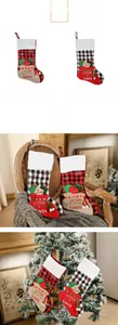 Detail of embroidered Christmas stocking with Santa letter pouch and festive patterns