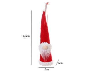 Detail view of 17.5cm Christmas gnome ornament with red hat and white plush beard