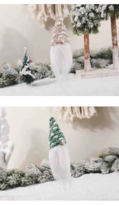 Detail of knitted Christmas gnomes with faux fur beards and snowflake pattern hats
