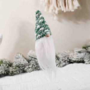Knitted green and white Christmas gnome ornament with faux fur beard for holiday tree decor