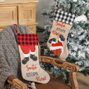Burlap Christmas stockings with red and black buffalo plaid and Santa chimney design