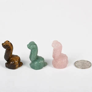 Lot de trois mini figurines de serpent en pierres naturelles oeil de tigre et quartz