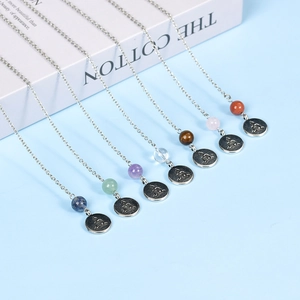 Collane con ciondolo buddista con sette pietre naturali e medaglie di Buddha