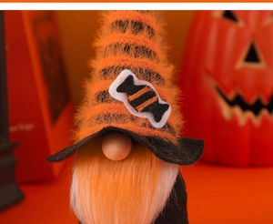 Close-up of Halloween gnome plush with orange beard and candy striped hat detail
