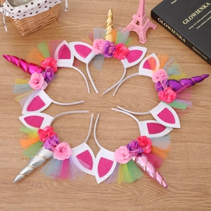 Detailed set of 5 unicorn headbands with glitter horns, faux flowers and rainbow tulle