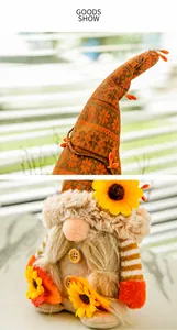 Detailansicht von Herbstgnom mit oranger Strickmütze, gelber Sonnenblume und Plüschbart