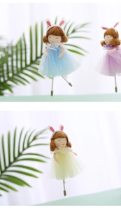 Detailed view of Easter ballet girl pendants with tulle skirts and bunny ears