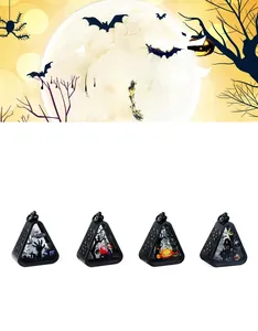 Detail showing four portable Halloween LED lanterns with zombie and pumpkin motifs