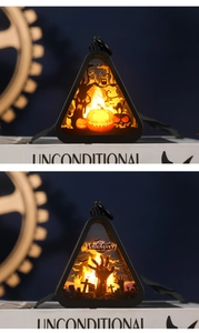 Close-up of LED Halloween lanterns with pumpkin and graveyard silhouette patterns