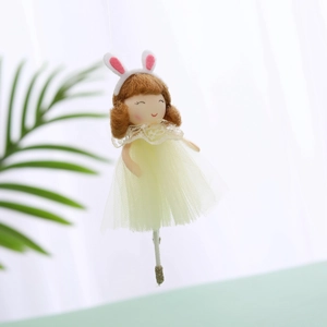 Handmade Easter bunny ballerina doll with pink ears and yellow mesh skirt for spring decor