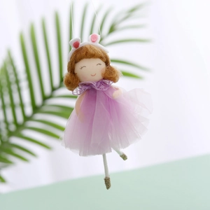 Handmade ballerina doll with purple tulle skirt and bunny ears for Easter decor