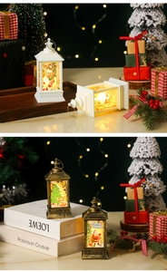 Detail van LED kerstlantaarns met kerstmanmotieven en warm wit lichteffect
