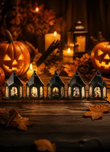 Set de cinco farolillos negros de Halloween con diseños de calabazas y castillos