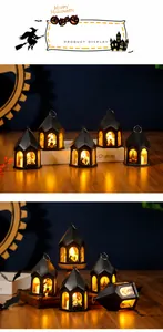 Detalle del farol de Halloween con siluetas de calabaza y efecto de luz LED cálida