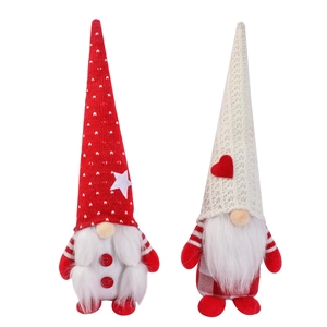 Pair of festive Christmas gnomes with red and white knit heart-patterned long pointed hats