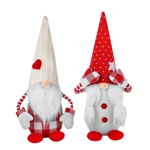 Set of two Christmas gnomes with knitted hats and heart star accents for holiday decor