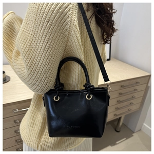Vintage glossy black tote bag with knot handle and fashion embossing for women