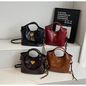 Sacs seaux style business rétro en noir, bordeaux, marron foncé et marron clair en simili cuir