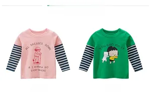 Detail of pink and green kids long sleeve t-shirts with striped layered sleeves