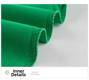 Detail view of the durable overlock stitching and high-quality inner seams of the green top