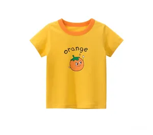 Detail of a bright yellow cotton kids T-shirt featuring orange trim and a cartoon print