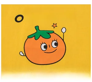 Detailed macro view of yellow cotton kids T-shirt with cartoon orange print and soft fabric