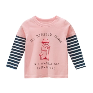 Pink long-sleeve toddler tee with striped sleeves and cartoon print on white backdrop