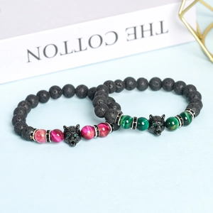Lava stone and tiger eye beaded bracelets with engraved wolf head charms for men