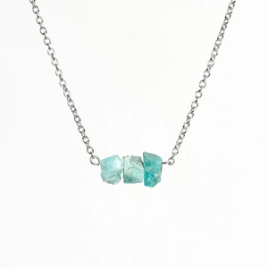 Light blue raw crystal gemstone necklace with a silver link chain for women