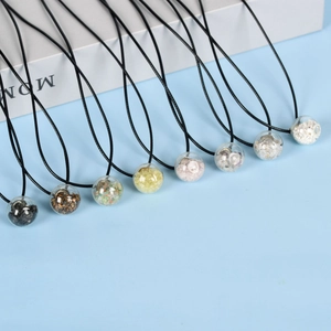 Eight crystal stone moon ball necklaces with natural mineral chips in vibrant colors